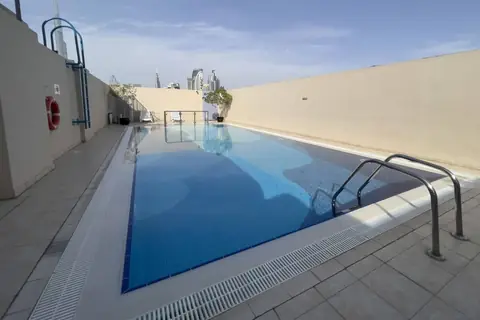 Rooftop pool facing the Dubai skyline